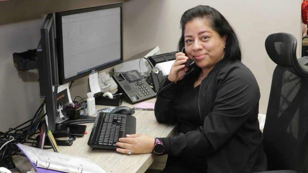 Photo of a receptionist at the Dermatology and Laser Center of San Antonio